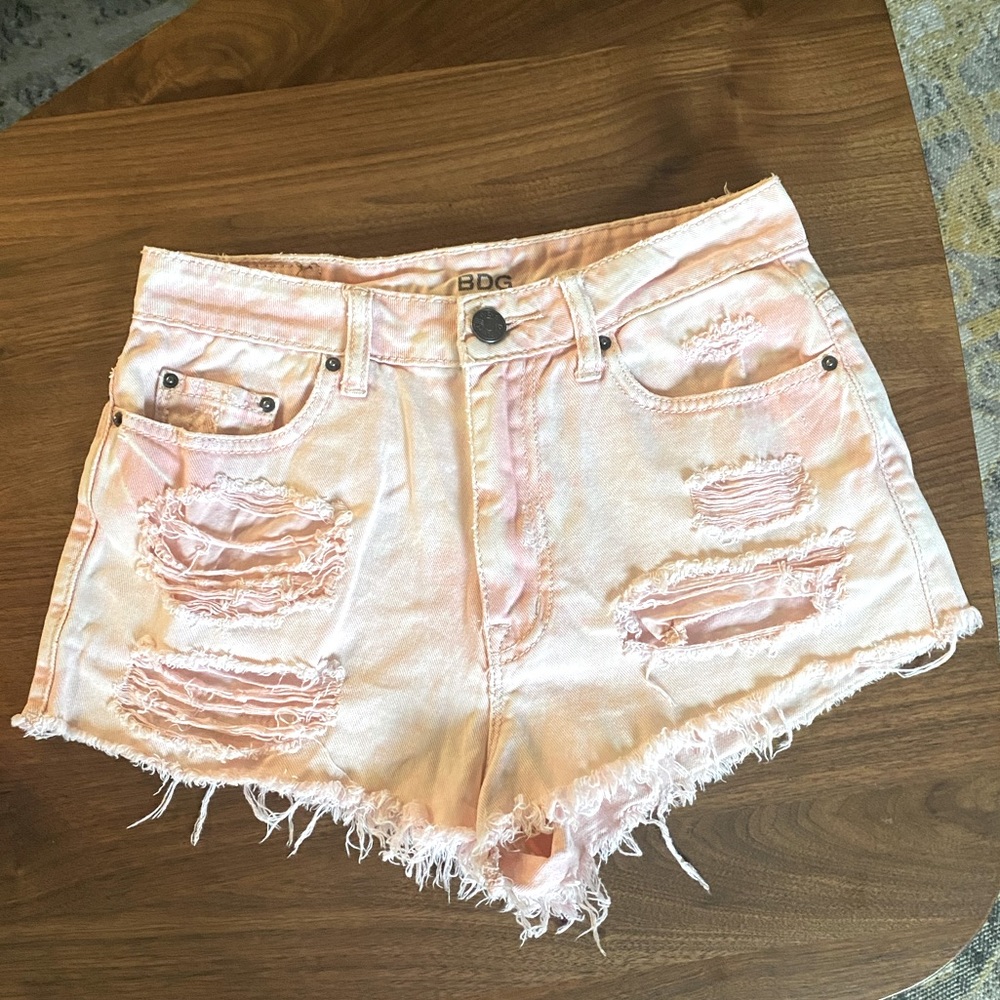BDG UO pink acid wash distressed shorts